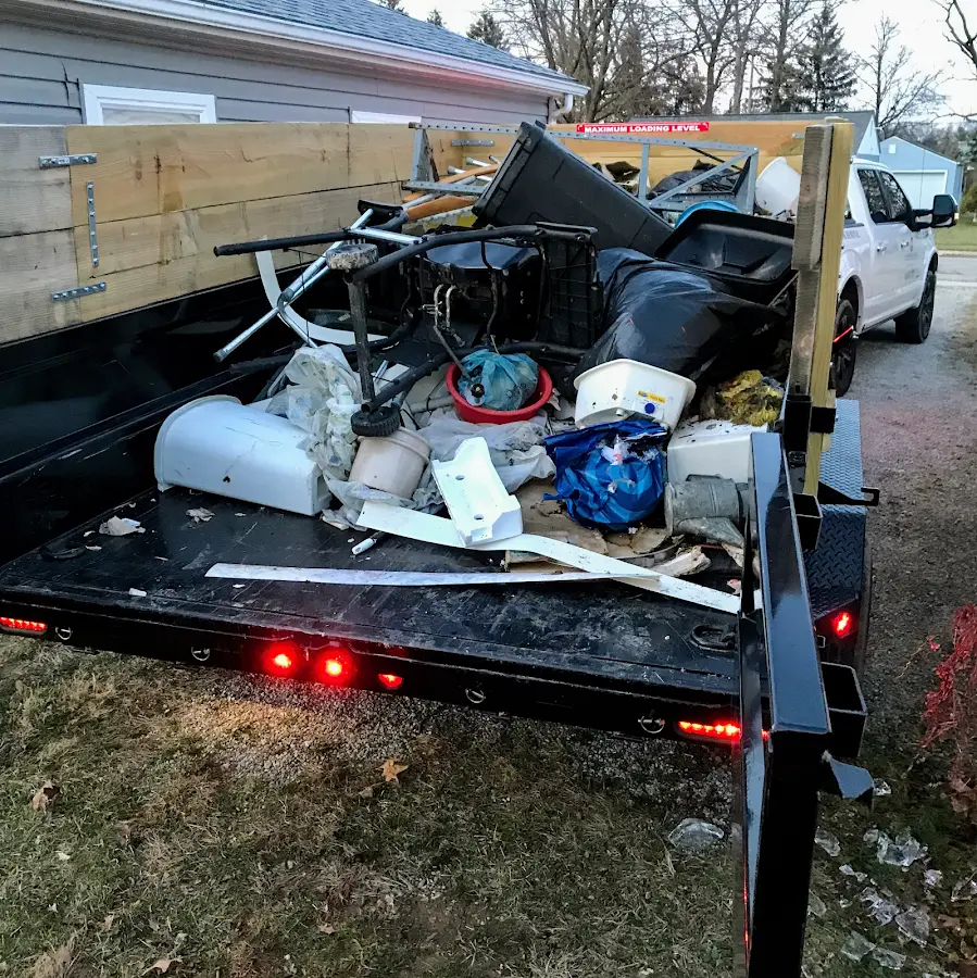 Roll-off dumpster delivered to a residential driveway in Desloge